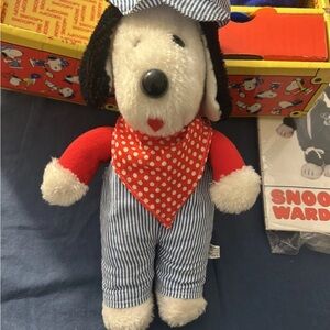 Plush Dog Toy with Red and Blue Outfit